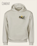 Das Bild zeigt das Tee Jays Heavy Loose Fit Hooded Sweatshirt 5162 in der Farbe Cement mit dem Statement-Design Think.