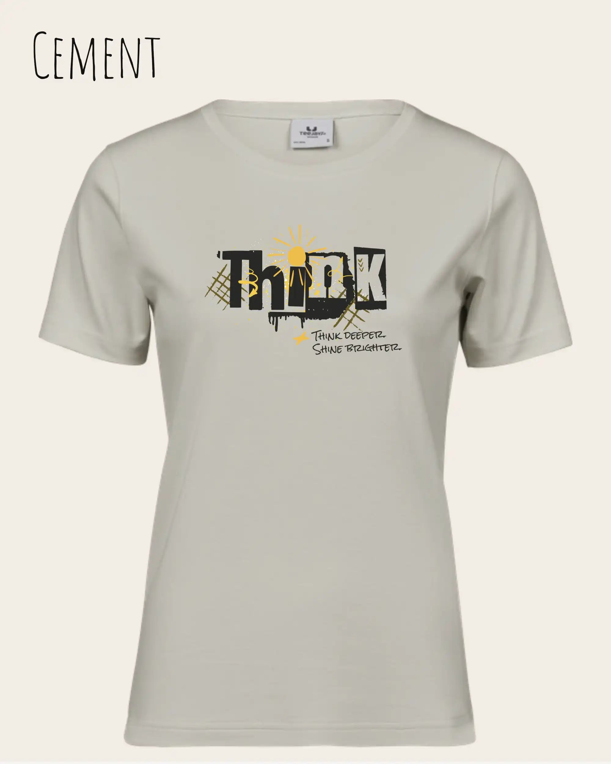 Die Abbildung zeigt ein feminines Grafik t-shirt in der farbe cement und mit dem Statement-design think deeper trägt.
