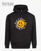 Das Bild zeigt den oversized hoodie jh111 von just hoods in der farbe deep black mit dem design notihing beats a great smile.