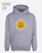 Das Bild zeigt den oversized hoodie jh111 von just hoods in der farbe Heather grey  mit dem design notihing beats a great smile.