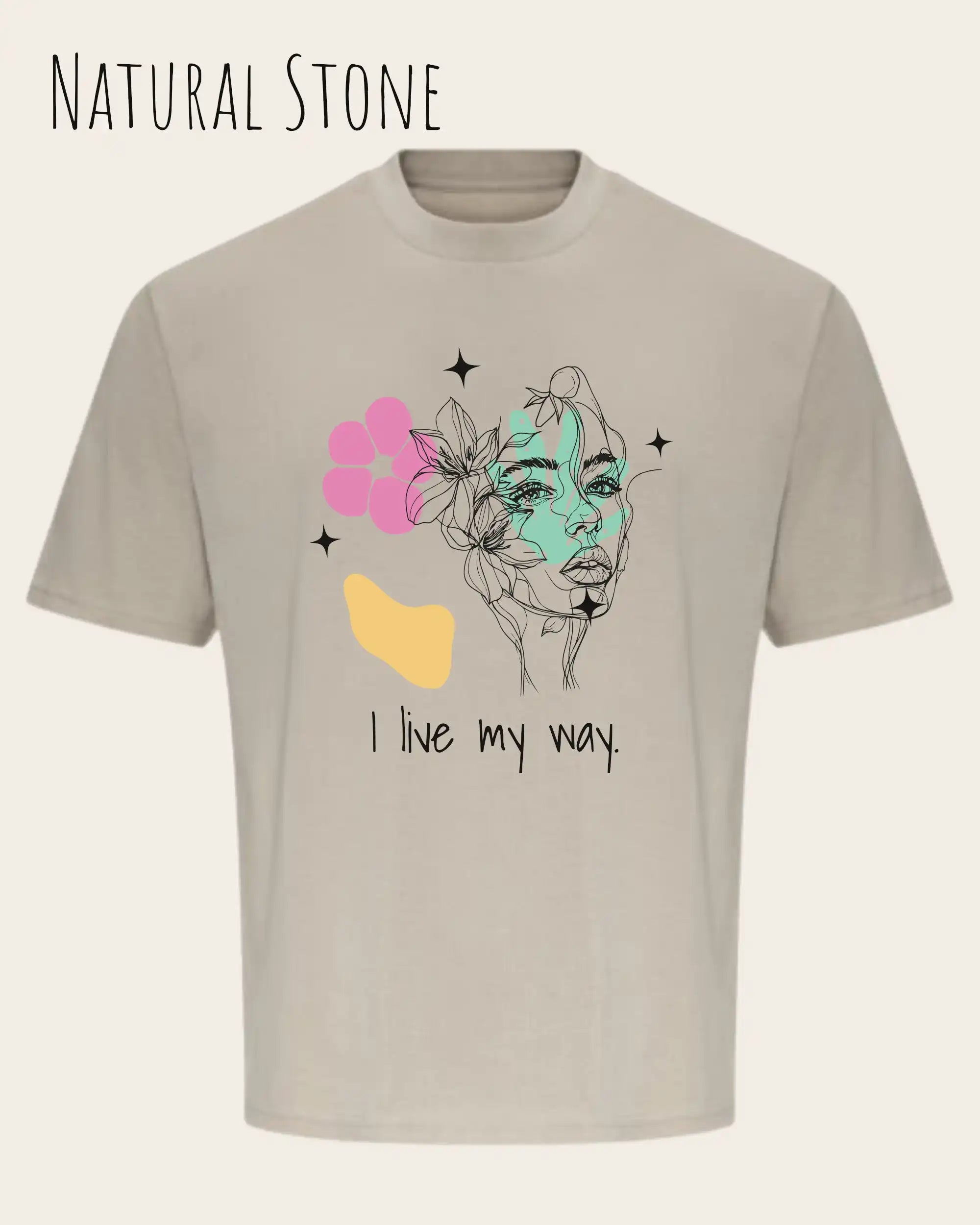 die Abbildung zeigt ein oversized heavyweight ndesign-t-shirt in der farbe natural stone und mit  dem motiv I live my way,