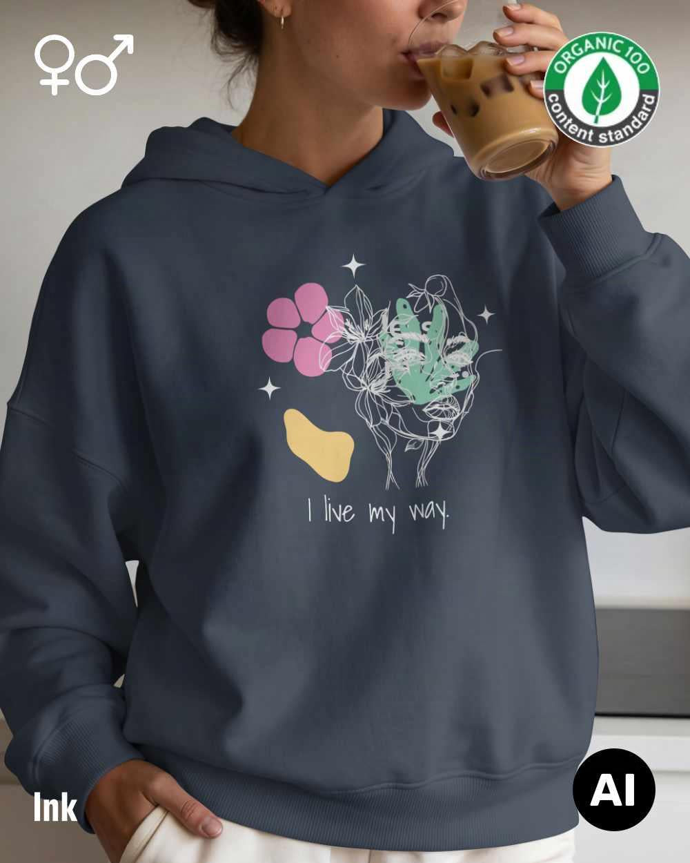 eine frau trägt einen Premium Design-Hoodie aus 100% Bio-Baumwolle in der farbe ink mit dem motiv "i live my way" vorne mittig auf der brust.