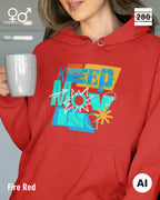 eine frau trägt einen unisex design hoodie in der farbe fire red mit dem motiv keep moving.
