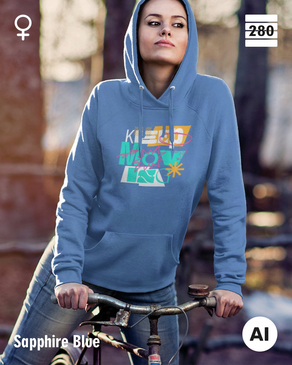 eine frau trägt einen leicht taillierten damen design hoodie in der farbe sapphire blue mit dem motiv keep moving.
