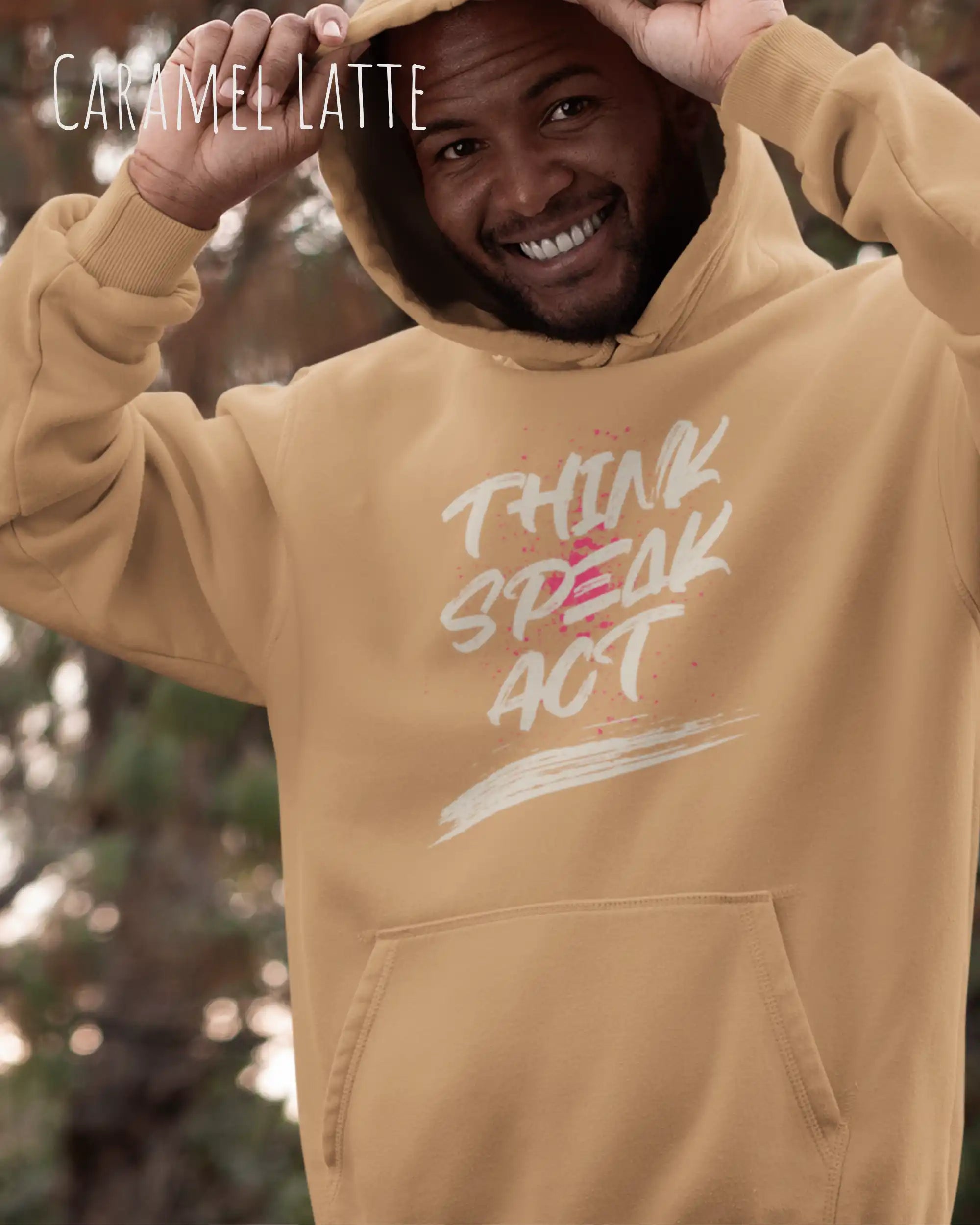 Ein Mann trägt den unisex basic hoodie JH001 von awdis in der Farbe caramel latte mit dem STATEMENT Design THINK SPEAK ACT  