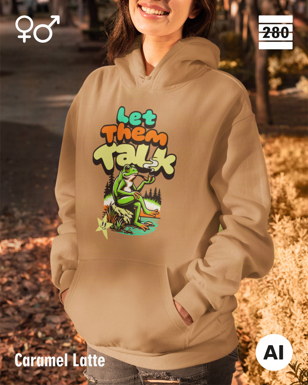 Eine frau trägt einen Design-Hoodie  in der farbe caramel latte mit dem humorvollen motiv "let them talk".