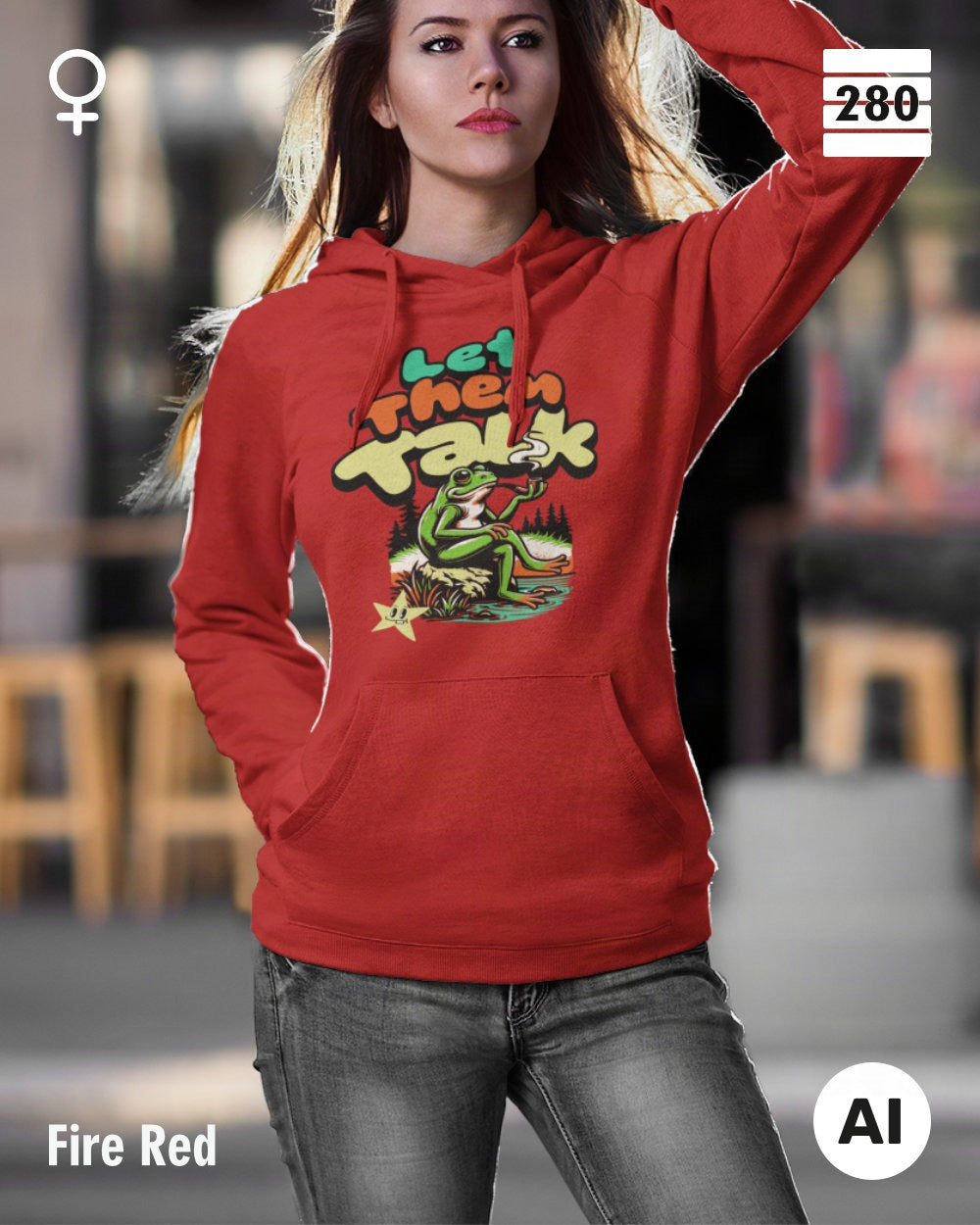 Das bild zeigt eine frau, die  einen Damen-Design-Hoodie in der farbe fire red mit dem humorvollen motiv "let them talk" trägt.