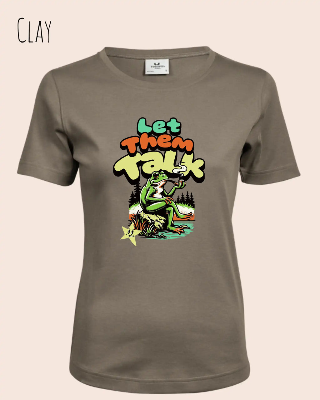 das bild zeigt das T-Shirt Tee Jays Women's Interlock Tee STYLE 580 in der farbe clay mit dem humorvollen design "LET THEM TALK".