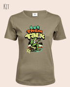 das bild zeigt das T-Shirt Tee Jays Women's Interlock Tee STYLE 580 in der farbe kit mit dem humorvollen design "LET THEM TALK".