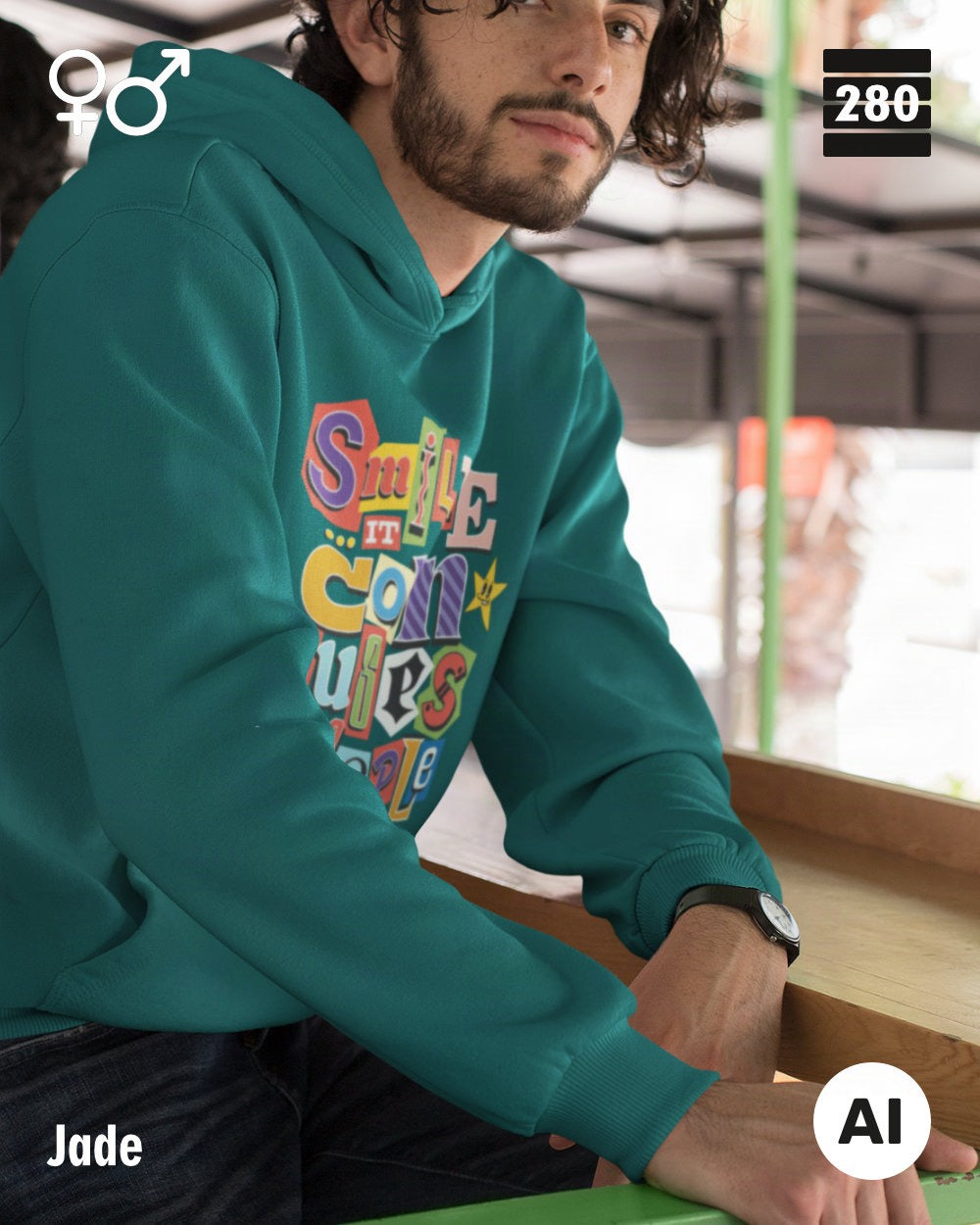 das bild zeigt eine person, die einen  design hoodie in der farbe jade und mit dem farbenfrohen motiv "smile ... it confuses people" trägt