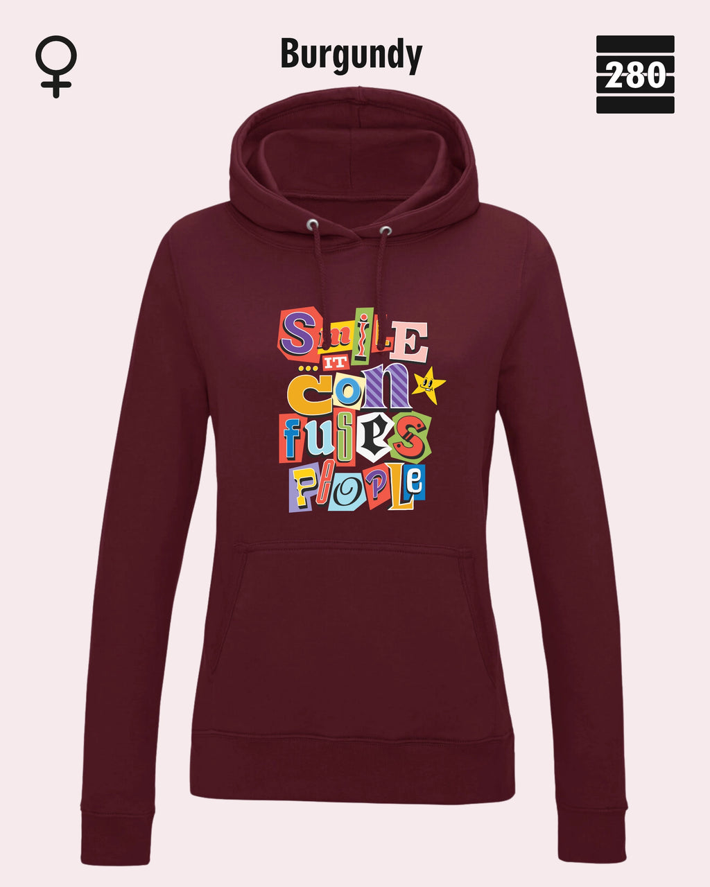 das bild zeigt den leicht taillierten damen design hoodie jh001 fvon just hoods in der farbe burgundy und mit dem farbenfrohen motiv "smile ... it confuses people".