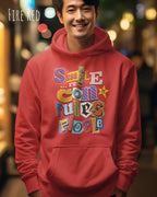 ein mann trägt einen Oversized Design-Hoodie in fire red mit der farbenfrohen grafik "Smile ... it confuses people".