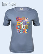 das bild zeigt das T-Shirt Tee Jays Women's Interlock Tee STYLE 580 in der farbe FLINT STONE mit dem farbenfrohen design "SMILE ... IT CONFUSES PEOPLE".