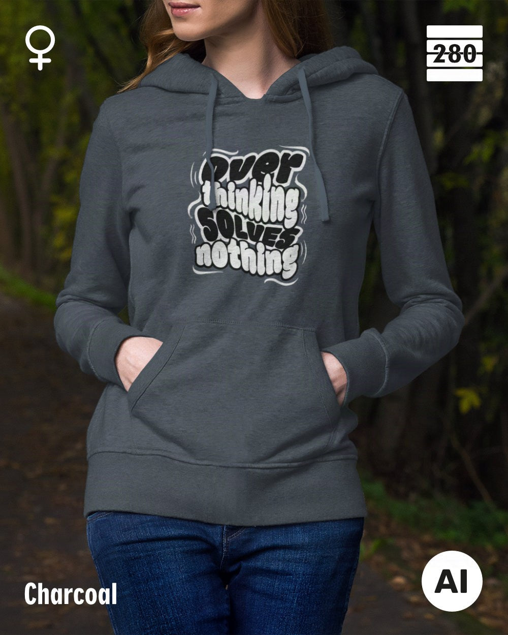 das bild zeigt eine frau, die einen leicht taillierten statement hoodie in der farbe charcoal und mit dem motiv "overthinking solves nothing" trägt.