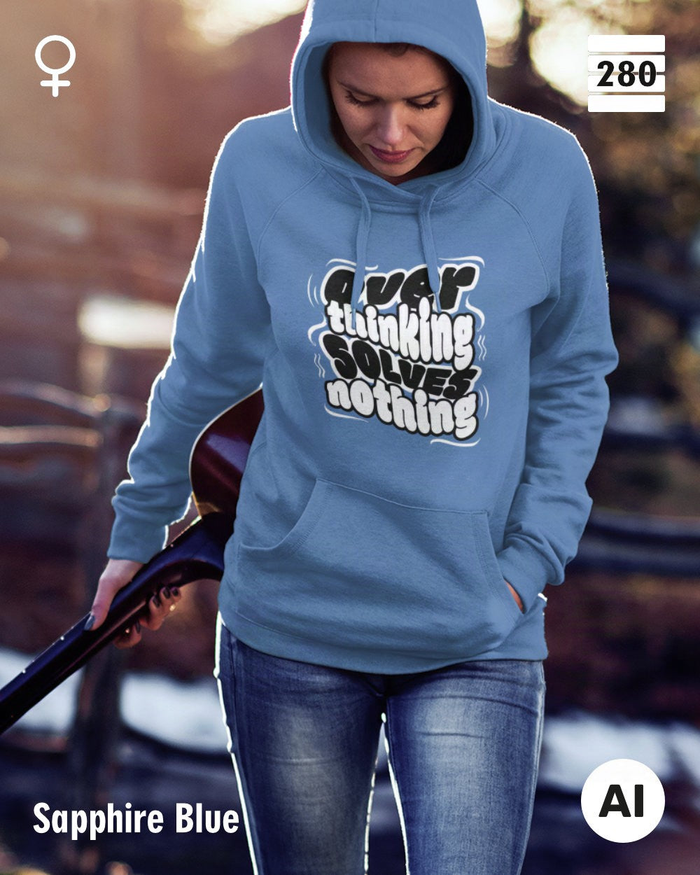 das bild zeigt eine frau, die einen statement hoodie in der farbe sapphire blue und mit dem motiv "overthinking solves nothing" trägt.