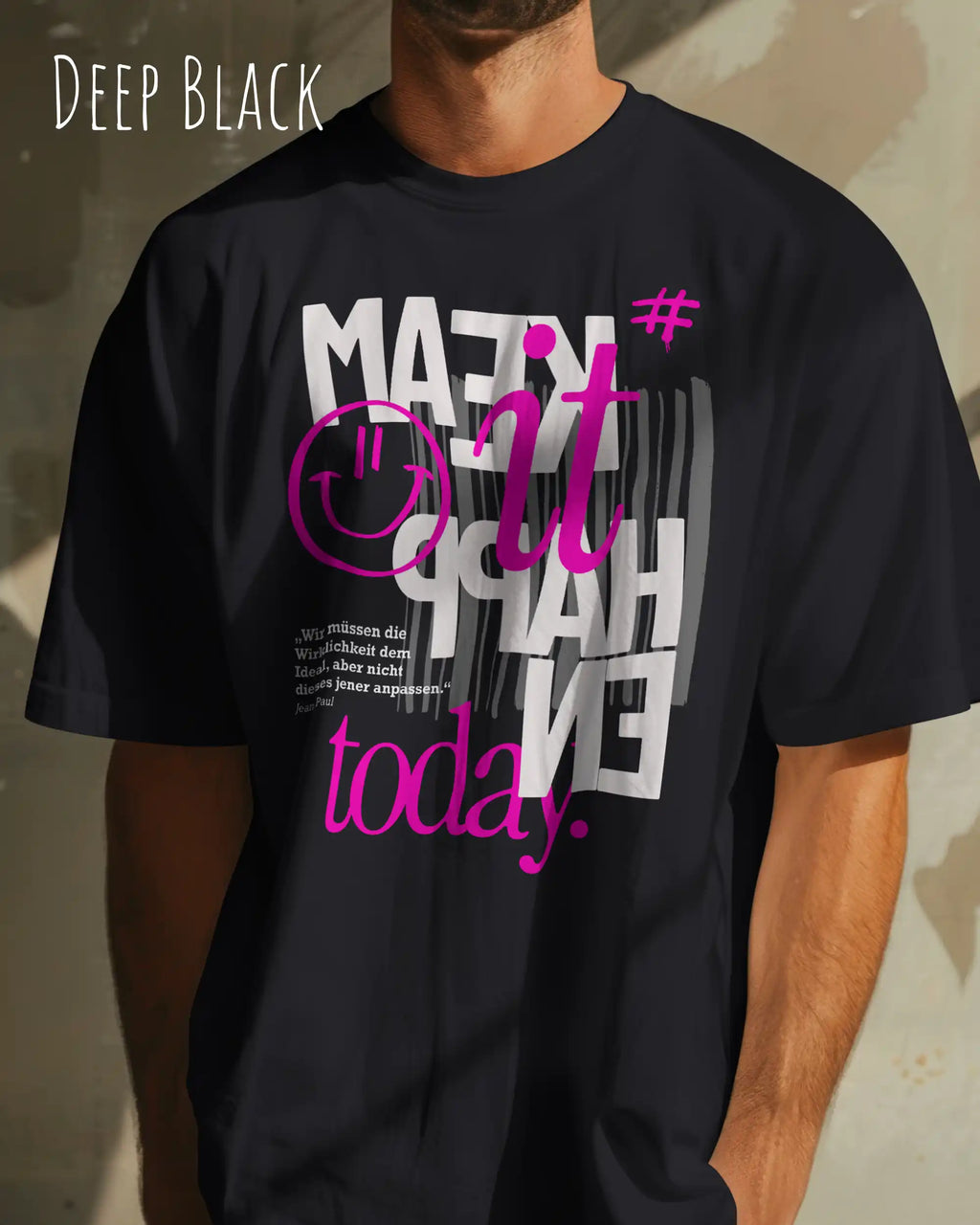 mann trägtt ein oversized heavyweight t-shirt in deep black mit dem design make it happen today.