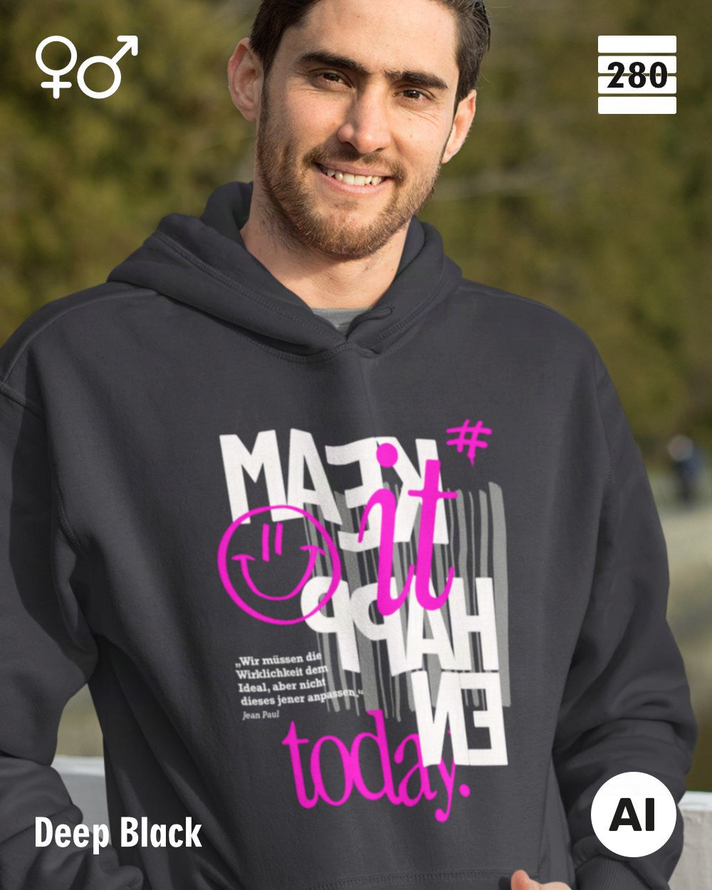 Das bild zeigt eine Person, die einen Design-Hoodie in der farbe deep black mit dem motiv "make it happen today" trägt.