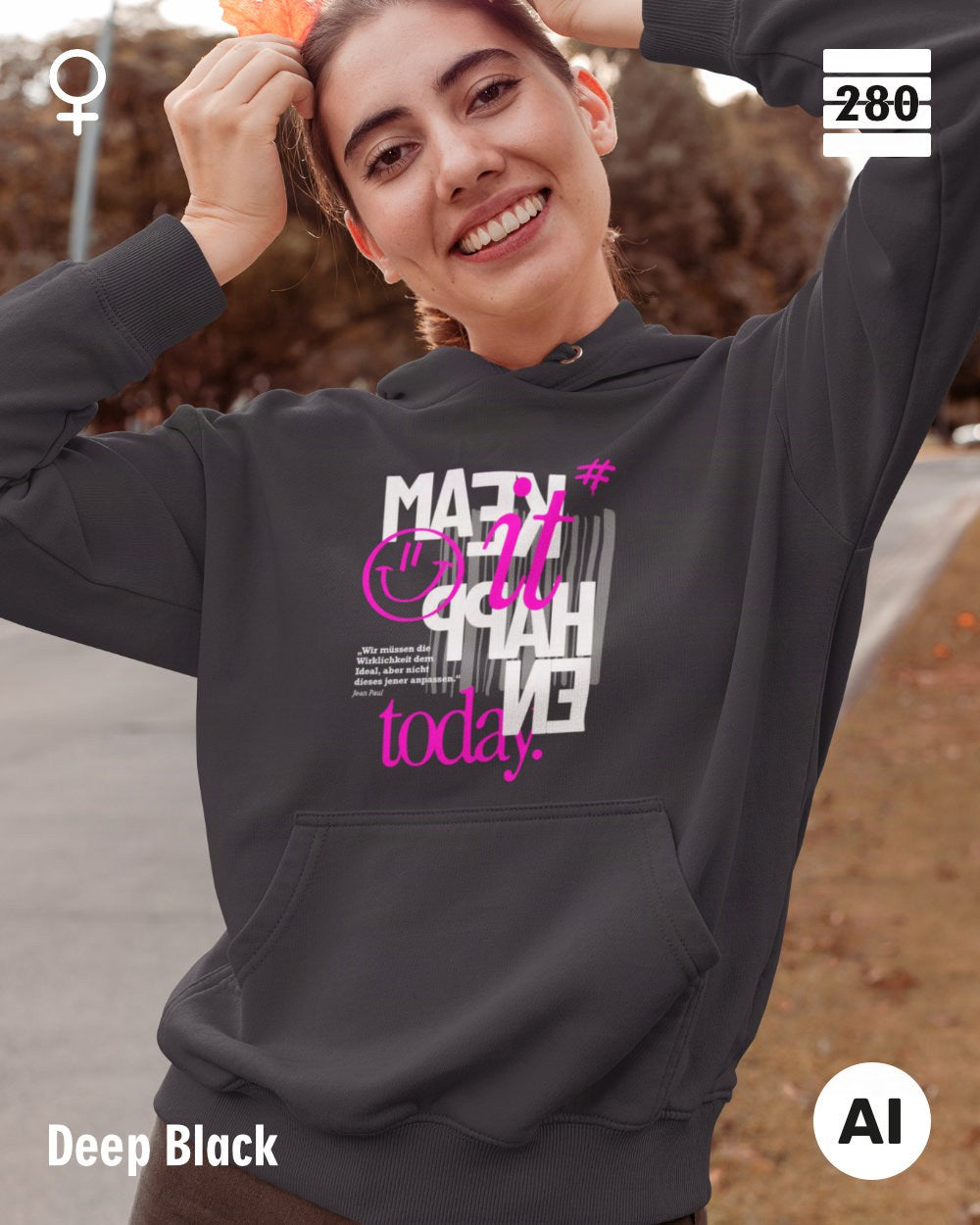 das bild zeigt eine frau, die einen leicht taillierten damen hoodie in der farbe deep black und mit dem statement design "make it happen today" trägt.