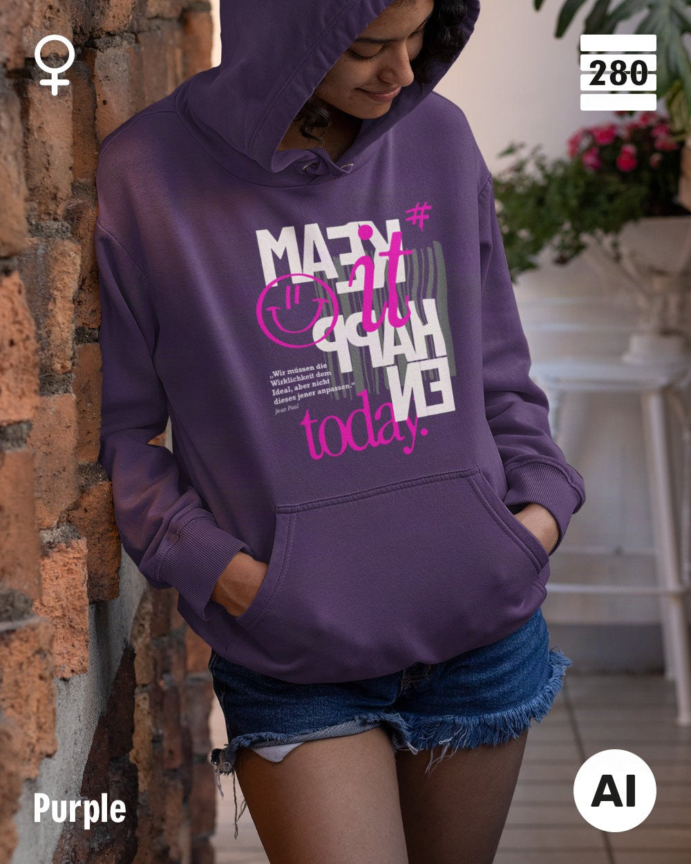 das bild zeigt eine frau, die einen statement hoodie in der farbe purple und mit dem motiv "make it happen" trägt.