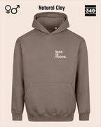 das bild zeigt den Oversized Design-Hoodie JH111 unisex in der farbe Natural clay mit dem minimalistischen motiv "less is more".