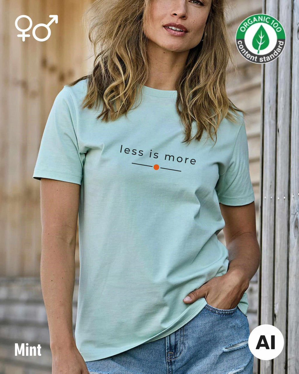 das bild zeigt eine frau, die ein nachhaltiges Design-T-Shirt T in der farbe mint mit dem eleganten Schriftzug „less is more“ trägt.