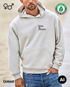 die ki-generierte Abbildung zeigt eine person, die einen oversized Premium Design-Hoodie (unisex) in der farbe cement mit dem minimalistischen motiv "less is more" trägt.
