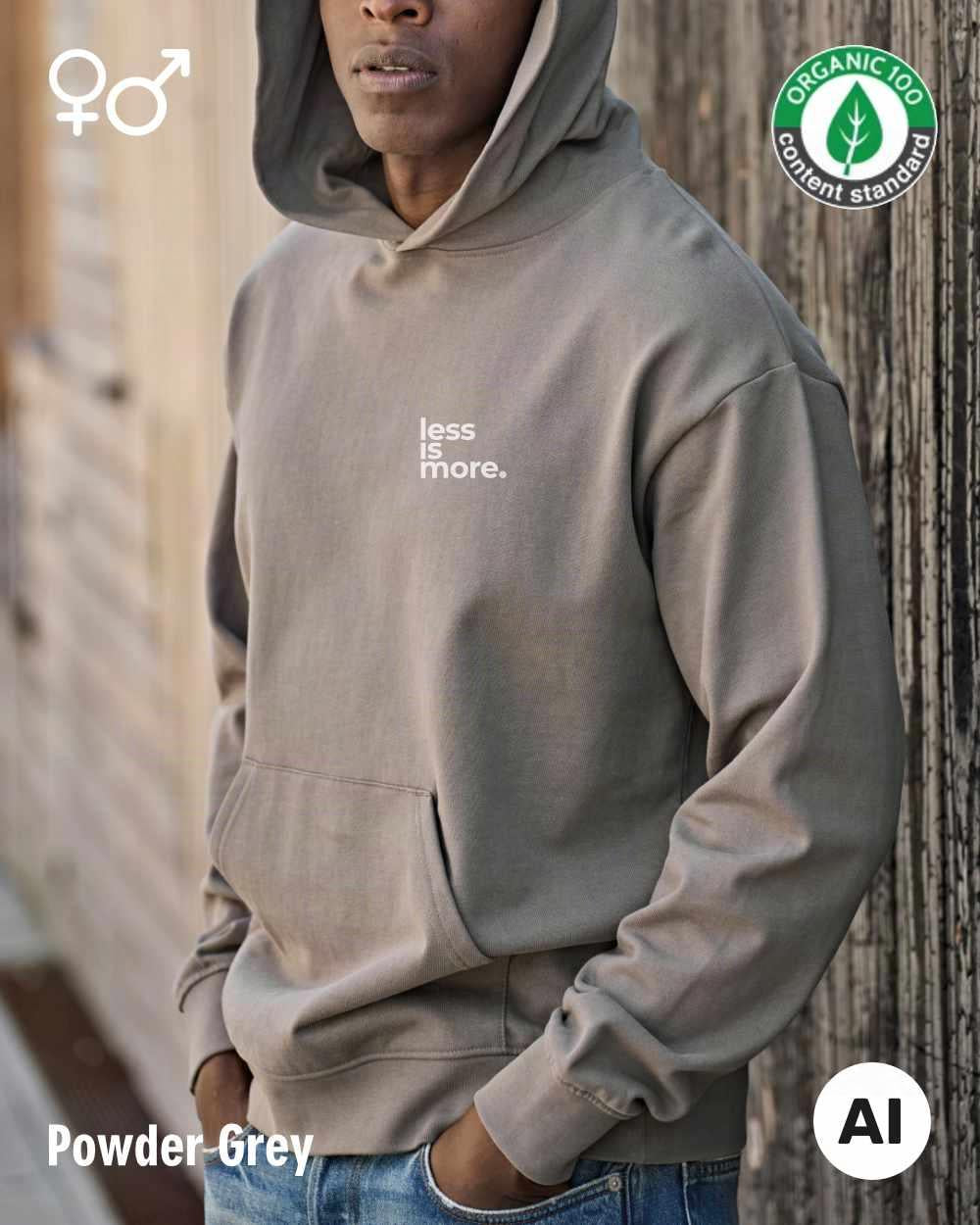 die ki-generierte Abbildung zeigt eine frau, die einen oversized Premium Design-person in der farbe powder grey mit dem minimalistischen motiv "less is more" trägt.