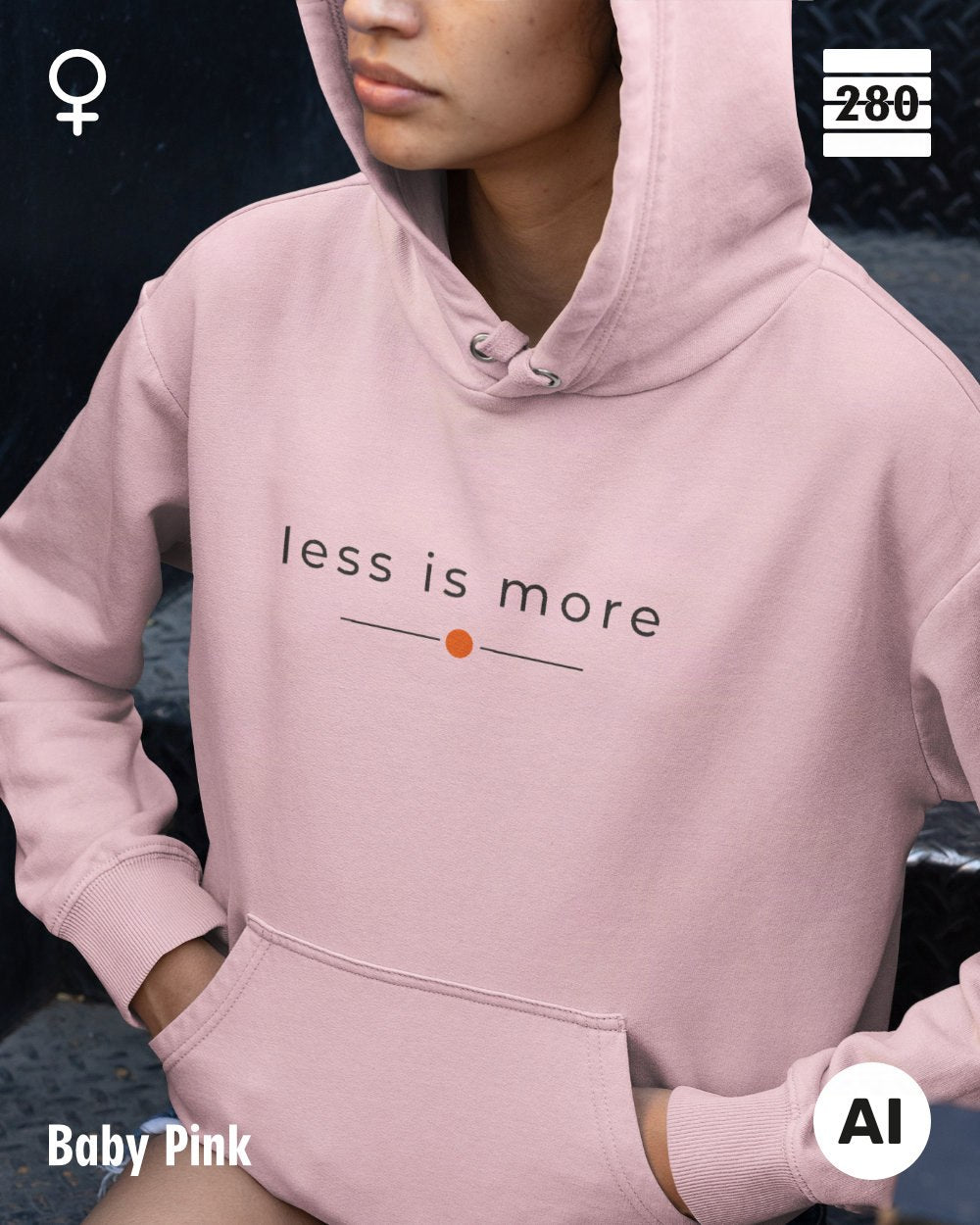 das bild zeigt eine frau, die einen leicht taillierten damen hoodie in der farbe baby pink und mit dem zeitlosen design "less is more" trägt.