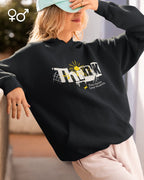 eine frau  trägt einen oversized design-hooduie  mit der Grafik think deeper - shine brighter.