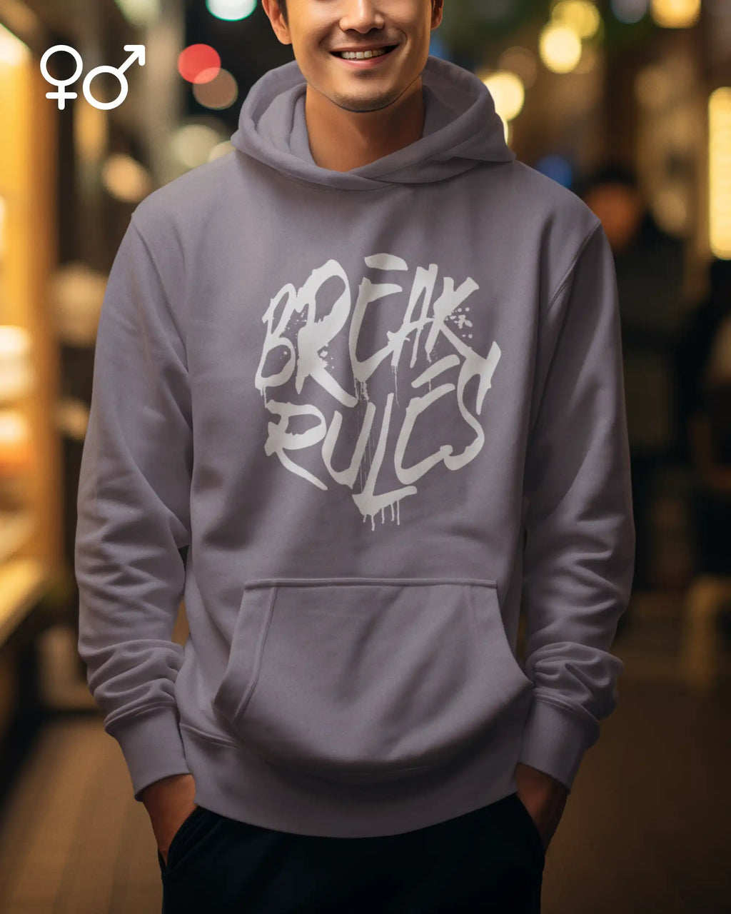 Ein Mann trägt ein unisex Design-T-Shirt in dusty lilac mit der Grafik Break Rules.