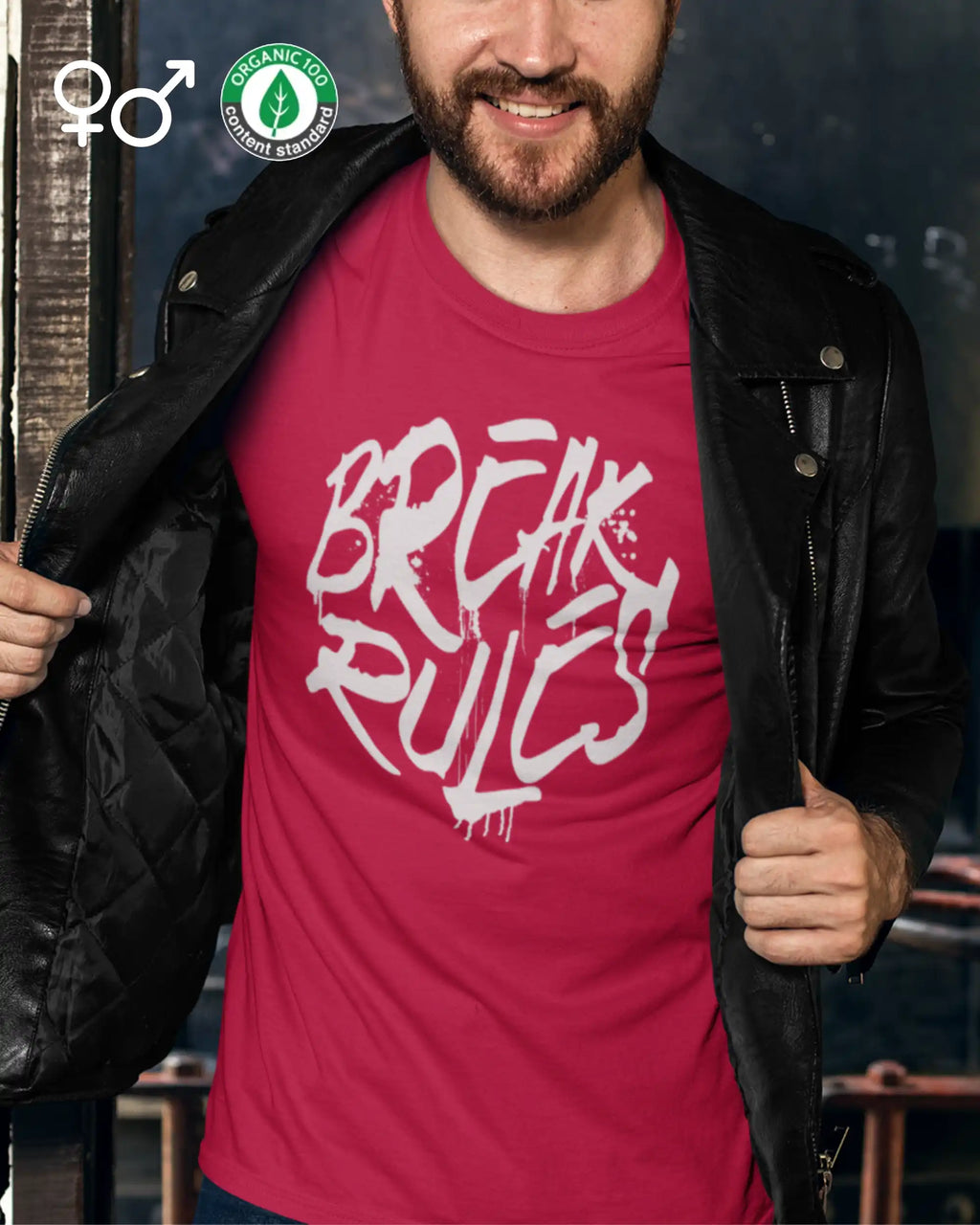 Ein Mann trägt ein Design-T-Shirt in rot mit der Grafik Break Rules.